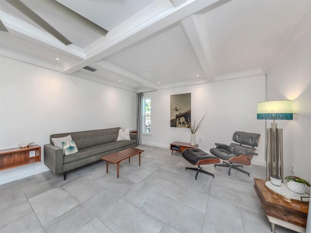 living room featuring beamed ceiling