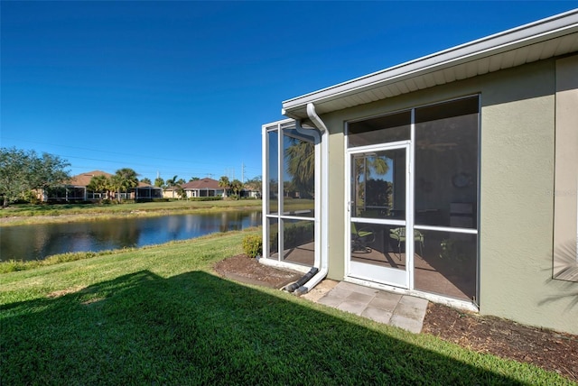 view of yard with a water view