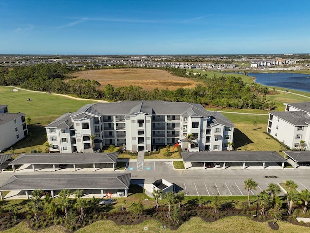 drone / aerial view with a water view