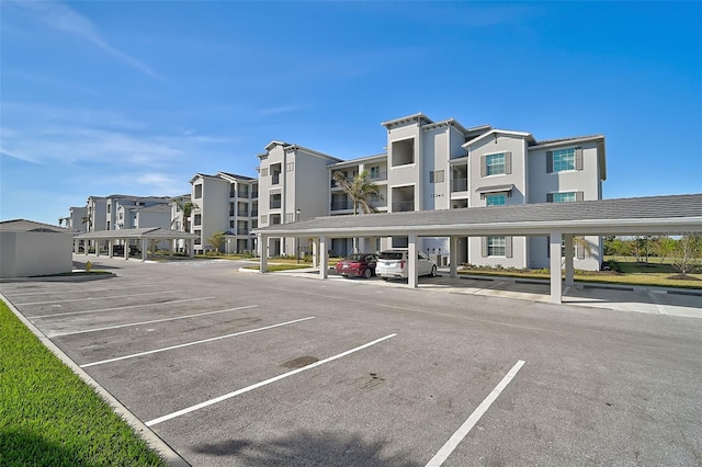 partially covered parking lot with a residential view