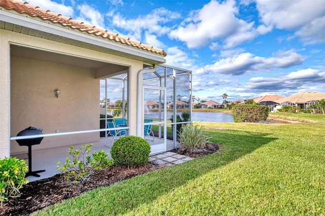 view of yard with a water view