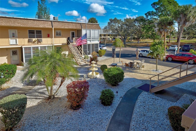 view of community with a patio area