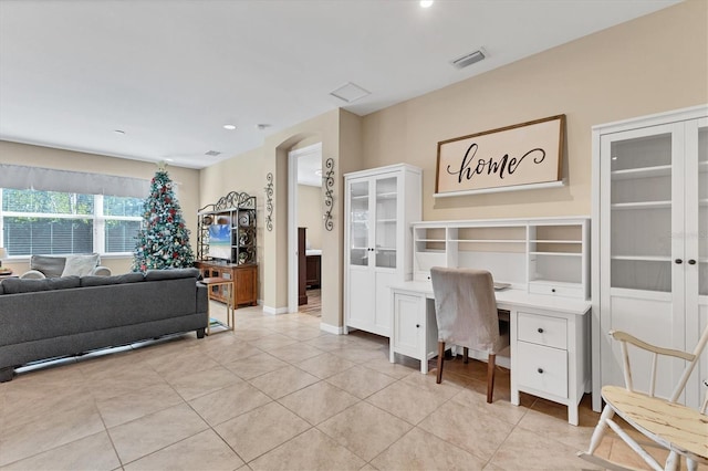 home office featuring light tile patterned floors