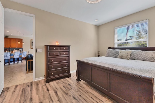 bedroom featuring light hardwood / wood-style flooring