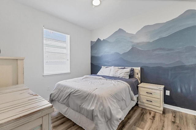 bedroom featuring hardwood / wood-style floors