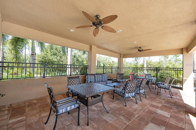 view of patio with an outdoor hangout area and ceiling fan