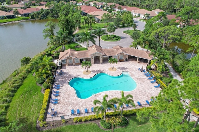 view of pool with a water view