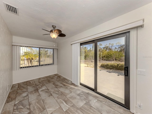 empty room with ceiling fan