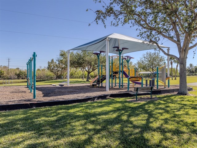 view of playground featuring a lawn