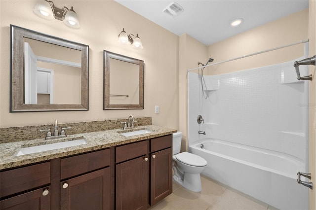 full bathroom featuring vanity,  shower combination, toilet, and tile patterned flooring