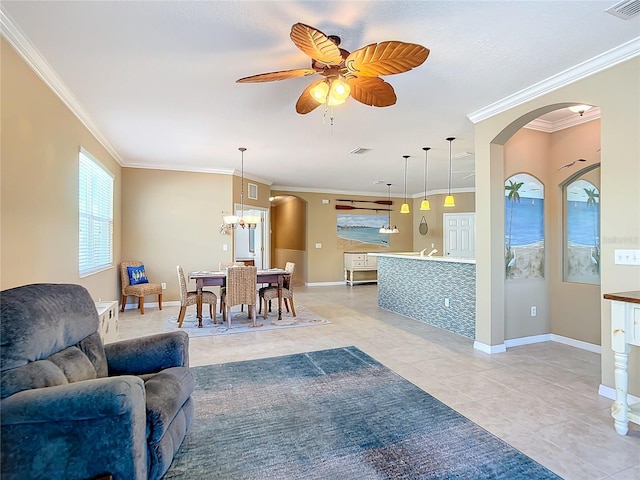 5255 Athens Way, Venice, FL 34293 - living area featuring arched walkways, crown molding, light tile patterned floors, a ceiling fan, and a chandelier