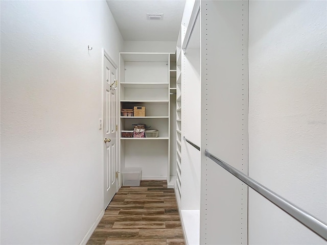 5255 Athens Way, Venice, FL 34293 - walk in closet featuring dark wood-style floors