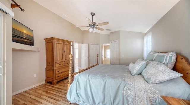 bedroom featuring ceiling fan, light hardwood / wood-style flooring, and vaulted ceiling