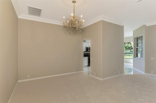 unfurnished room featuring light carpet, ornamental molding, and a notable chandelier