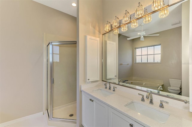 full bathroom with vanity, ceiling fan, plus walk in shower, and toilet