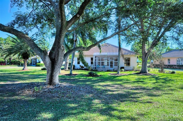 exterior space with a lawn