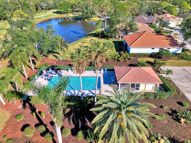 birds eye view of property featuring a water view