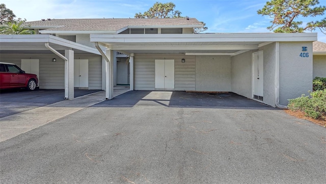 view of front of house with a carport