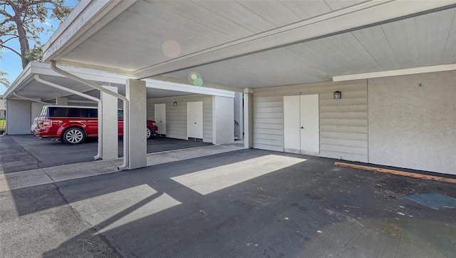 garage with a carport