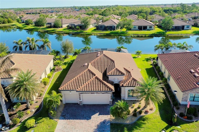 bird's eye view with a water view