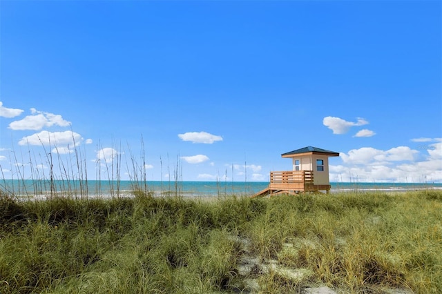 view of water feature with a beach view