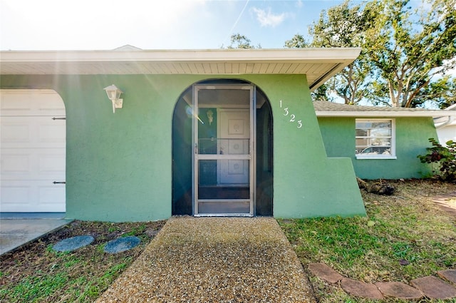 entrance to property with a garage