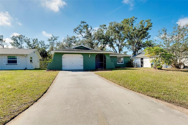 ranch-style home with a garage and a front yard