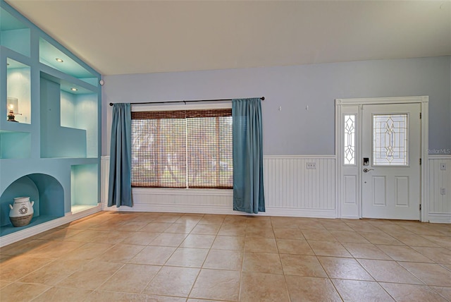 foyer with light tile patterned floors