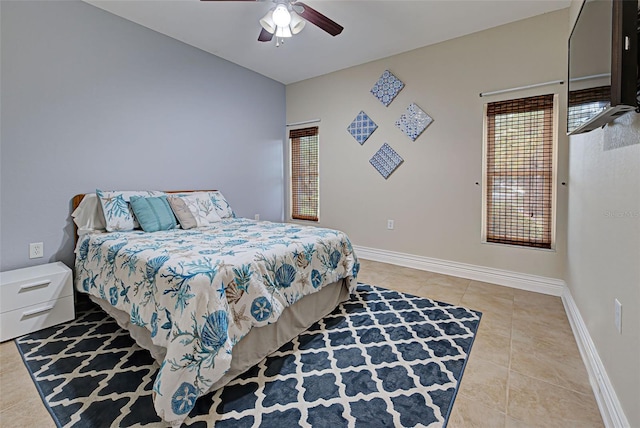 bedroom featuring ceiling fan and light tile patterned floors