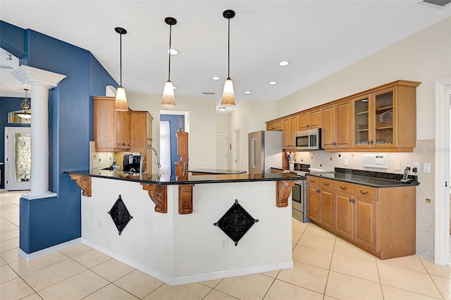 kitchen featuring decorative backsplash, decorative light fixtures, stainless steel appliances, and light tile patterned floors