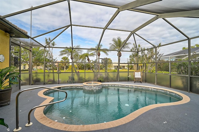 view of pool featuring glass enclosure and a water view