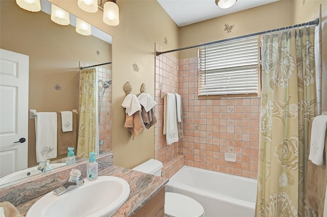 full bathroom with vanity, toilet, and shower / bathtub combination with curtain