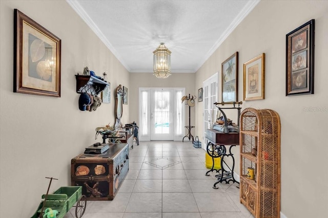 interior space with an inviting chandelier, light tile patterned floors, crown molding, and french doors