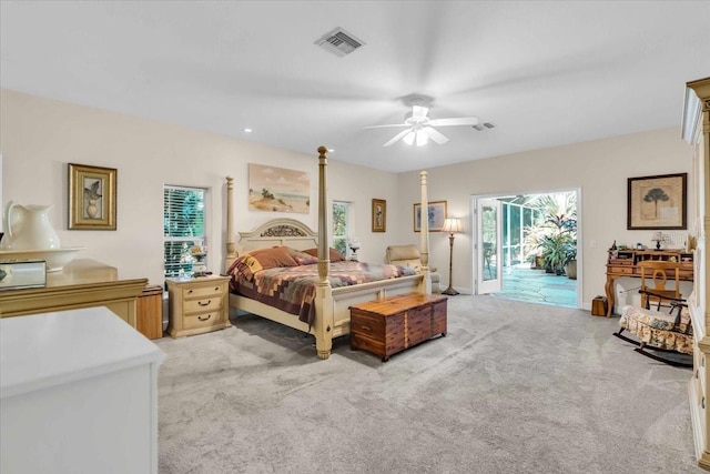 carpeted bedroom with access to outside and ceiling fan