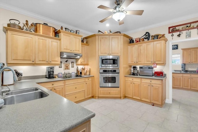 kitchen featuring stainless steel appliances, ceiling fan, crown molding, sink, and light brown cabinets