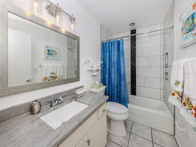 full bathroom featuring tile patterned floors, shower / bath combo with shower curtain, vanity, and toilet