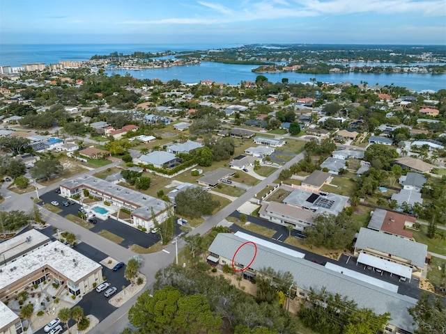 drone / aerial view with a water view