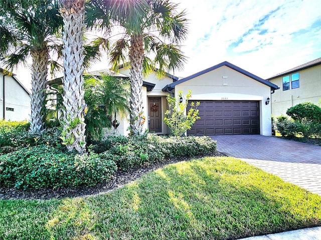 view of front of property with a garage