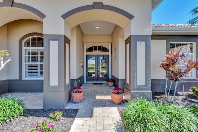 doorway to property with french doors