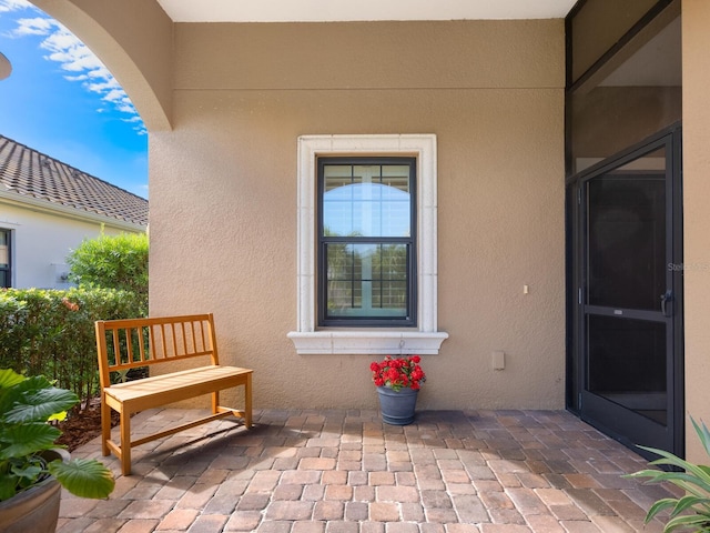 property entrance with a patio area