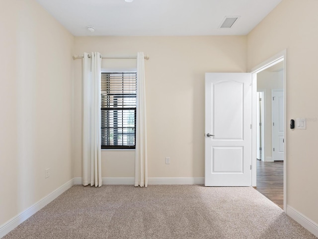 empty room featuring carpet