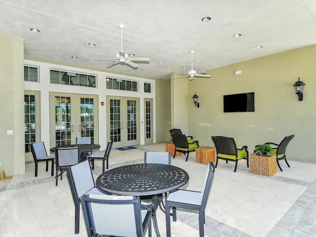 view of patio featuring ceiling fan and french doors