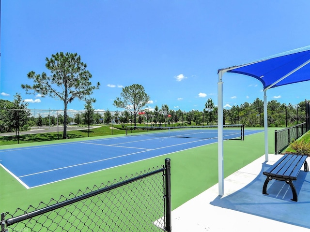 view of tennis court with basketball court