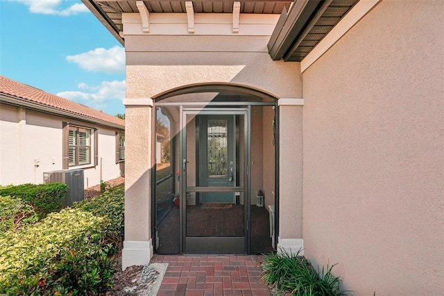 property entrance with central AC unit