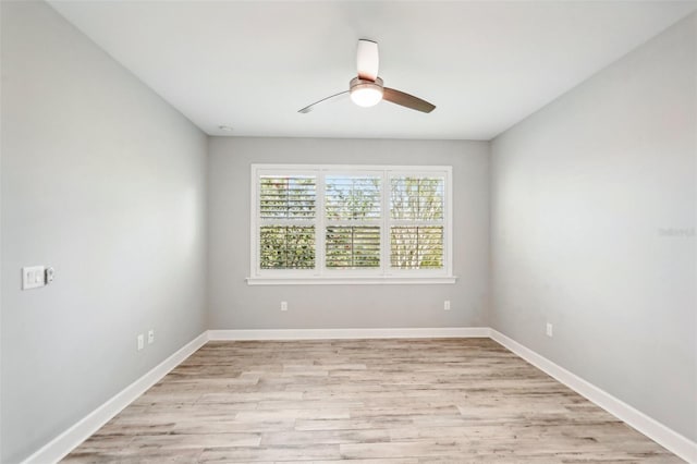 unfurnished room featuring ceiling fan and light hardwood / wood-style flooring