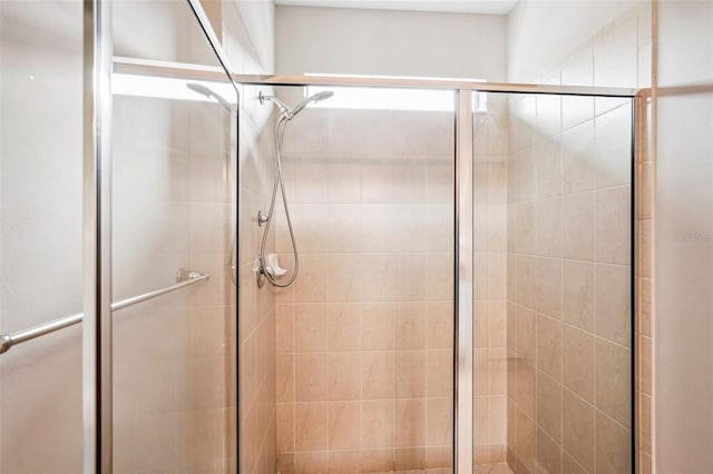 bathroom featuring an enclosed shower