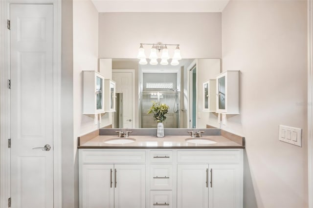 bathroom with vanity and an enclosed shower