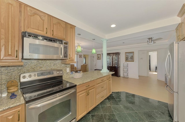 kitchen with ornate columns, light brown cabinets, backsplash, crown molding, and appliances with stainless steel finishes