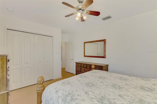 bedroom with a closet and ceiling fan