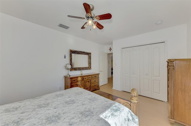 bedroom with a closet and ceiling fan